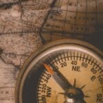 Compass on top of a map